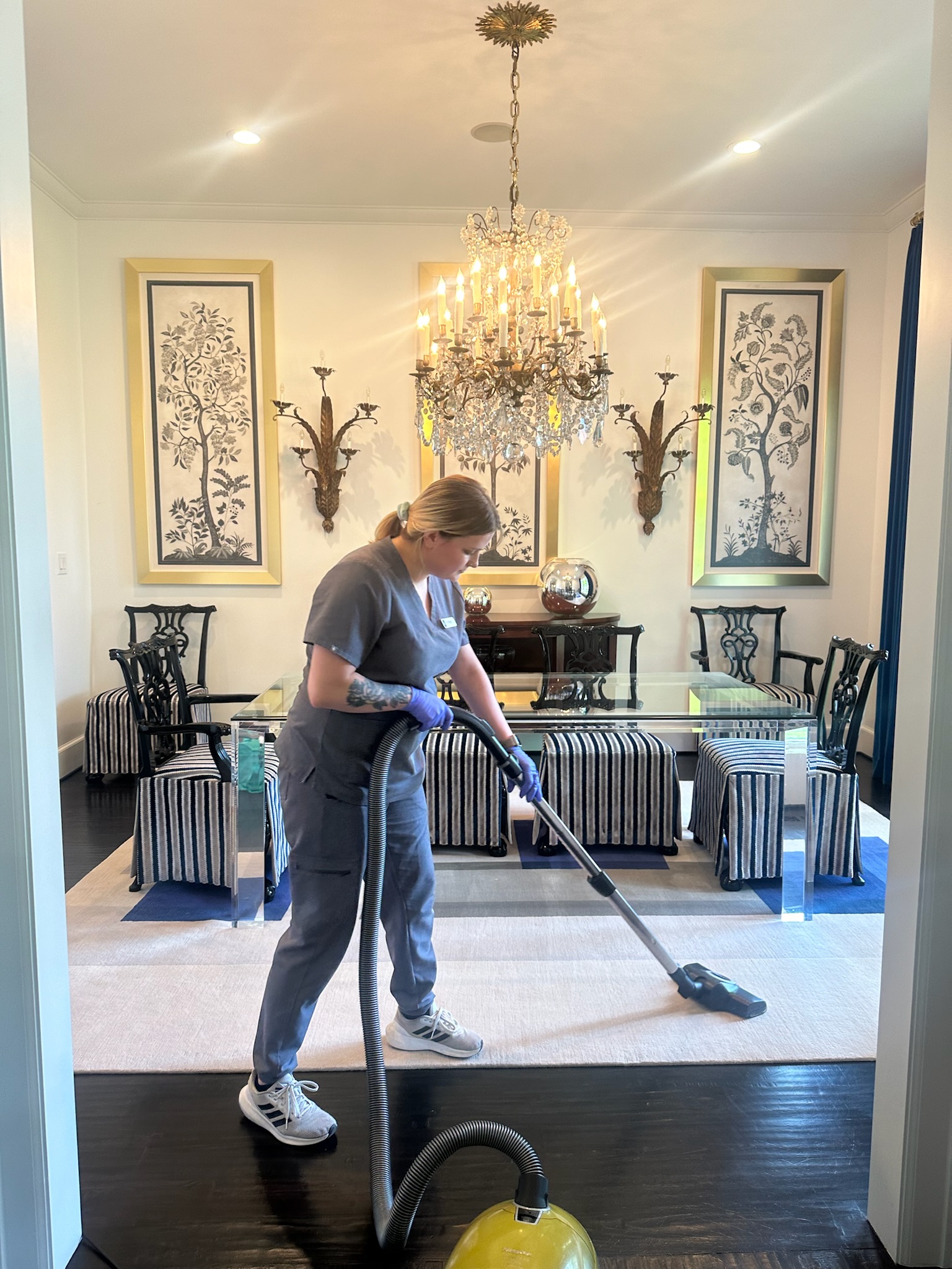 Vella’s staff vacuumed the floor after cleaning the chandelier.