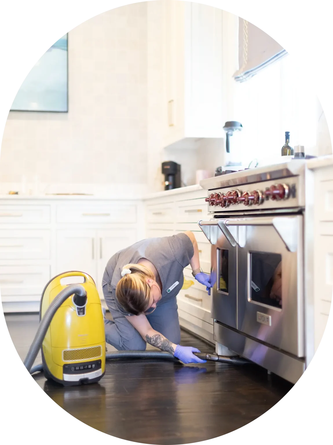 Vella’s staff is cleaning the kitchen using a vacuum.