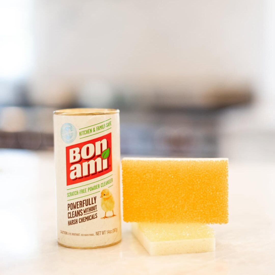 Close-up of Bon Ami cleaner and sponge used by Vella for safe, trusted house cleaning.
