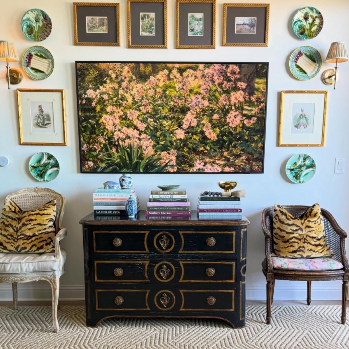 A clean, styled living room in Dallas with a tidy coffee table, neutral furniture, and soft lighting after a professional Vella home cleaning.